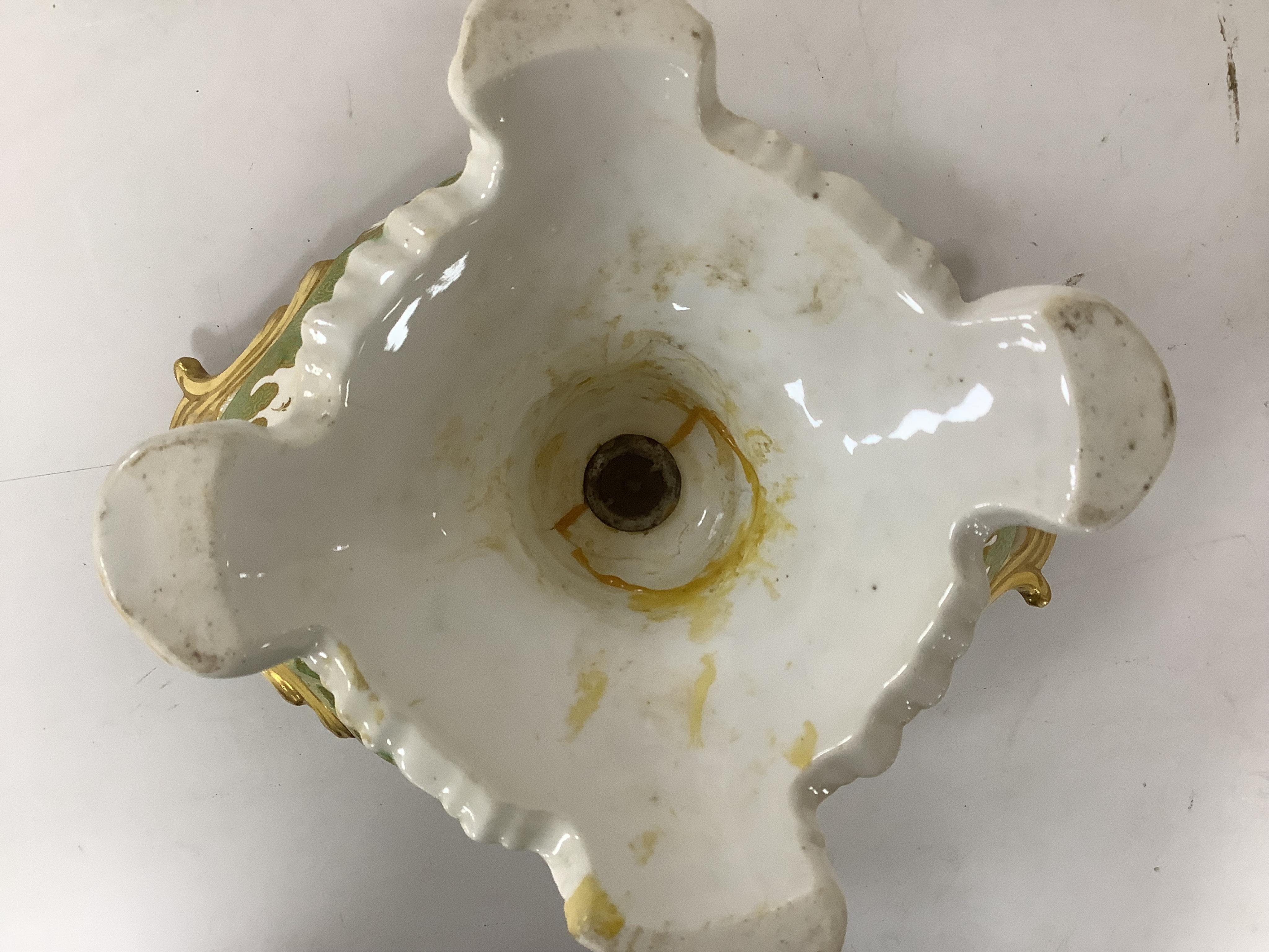 A circa 1835 part dessert set of floral and gilt decorated Rockingham style china, pattern number 6626, centrepiece 34cm wide. Condition - small comport cover cracked badly, some wear to gilding and pattern on plates